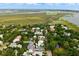 An aerial view showcases the neighborhood near 926 Pitt Street, with lush greenery and waterfront access at 926 Pitt St, Mount Pleasant, SC 29464
