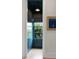 A small blue tiled bathroom with a window that offers a lovely view at 926 Pitt St, Mount Pleasant, SC 29464