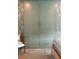Bedroom closet features painted doors with brass hardware and built-in drawers at 926 Pitt St, Mount Pleasant, SC 29464