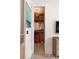View of walk-in closet with shelves and rods for hanging clothes, and an eye-catching ceiling light at 926 Pitt St, Mount Pleasant, SC 29464