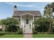 Charming front entrance featuring a brick walkway and stairs leading to a quaint porch at 926 Pitt St, Mount Pleasant, SC 29464