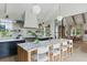 Spacious kitchen features a center island, marble counters, and modern lighting at 926 Pitt St, Mount Pleasant, SC 29464