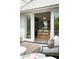 Inviting patio with outdoor seating that looks into a modern kitchen space at 926 Pitt St, Mount Pleasant, SC 29464