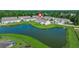 Aerial view of townhomes surrounding pond in this community at 9712 Transplanter Cir, Ladson, SC 29456