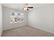 Bedroom featuring neutral walls, carpet, and a window with neighborhood views at 9712 Transplanter Cir, Ladson, SC 29456