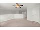 Large upstairs landing area boasts neutral walls, carpet, and a bright, airy feel at 9712 Transplanter Cir, Ladson, SC 29456