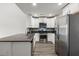 View of the kitchen featuring stainless appliances and white cabinets at 9712 Transplanter Cir, Ladson, SC 29456
