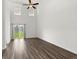 Spacious living room with ample natural light and vinyl flooring at 9712 Transplanter Cir, Ladson, SC 29456