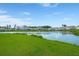Beautiful view of the pond and green grass in this Gathering-friendly community at 9712 Transplanter Cir, Ladson, SC 29456