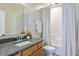 Bathroom featuring granite countertop and shower with curtain at St, Saint George, SC 29477