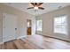 Bedroom featuring wood-look flooring and ensuite bathroom access at St, Saint George, SC 29477