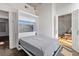 Bedroom featuring a murphy bed, exposed ceiling and hardwood style floor at 1 Cool Blow St # 124, Charleston, SC 29403