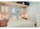 Cozy bedroom with a plush bed, nightstands and overhead storage at 1 Cool Blow St # 124, Charleston, SC 29403