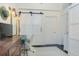 Bright bedroom with neutral decor, sliding barn door, and modern lighting at 1 Cool Blow St # 124, Charleston, SC 29403