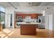 Modern kitchen with stainless appliances, island and hardwood floors at 1 Cool Blow St # 124, Charleston, SC 29403