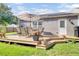 Inviting backyard featuring a spacious deck, perfect for outdoor dining and entertaining guests at 100 Runnels Cv, Summerville, SC 29485