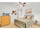 Bedroom with a bed, dresser, TV, ceiling fan, and natural light from the window at 100 Runnels Cv, Summerville, SC 29485