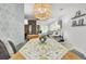 Bright dining area featuring stylish decor and light-filled spaces at 100 Runnels Cv, Summerville, SC 29485