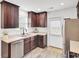 Kitchen with stainless steel appliances, light countertops, and wood-look flooring at 100 Runnels Cv, Summerville, SC 29485