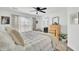 Bright bedroom with large windows, a ceiling fan, and modern furniture at 100 Runnels Cv, Summerville, SC 29485