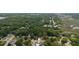 An aerial view of a home, neighborhood, and a tranquil river in the distance at 1002 Sea Gull Dr, Mount Pleasant, SC 29464