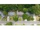 Aerial view of a home with mature tree coverage and driveway at 1002 Sea Gull Dr, Mount Pleasant, SC 29464