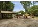 Community playground featuring play structures and a covered picnic table at 1002 Sea Gull Dr, Mount Pleasant, SC 29464