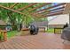 Charming back deck with a pergola and a view of the backyard at 103 Retriever Ln, Goose Creek, SC 29445