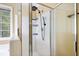 Bathroom featuring tile and glass shower with black hardware and built-in shelving at 103 Retriever Ln, Goose Creek, SC 29445