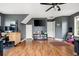 Spacious bedroom with wood floors, a ceiling fan, and lots of natural light at 103 Retriever Ln, Goose Creek, SC 29445