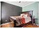 Bedroom with dark wood floors, two-tone painted walls, and dark wood furniture at 103 Retriever Ln, Goose Creek, SC 29445