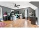 Bright bedroom with wood floors, a ceiling fan, and natural light at 103 Retriever Ln, Goose Creek, SC 29445