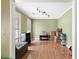 Bright living room with wood laminate flooring and natural lighting at 103 Retriever Ln, Goose Creek, SC 29445