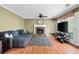 Comfortable living room with a cozy fireplace and a large sectional sofa for relaxing at 103 Retriever Ln, Goose Creek, SC 29445