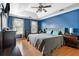 Spacious main bedroom with a trey ceiling, ceiling fan, and hardwood floors at 103 Retriever Ln, Goose Creek, SC 29445