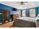 Comfortable main bedroom with blue walls, hardwood floors, and plenty of natural light at 103 Retriever Ln, Goose Creek, SC 29445