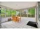 Cozy sun room with tile flooring and lots of natural light at 103 Retriever Ln, Goose Creek, SC 29445
