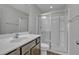 Clean and modern bathroom featuring a step-in shower with glass door at 1034 Lexi Ct, Ladson, SC 29456