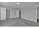 Spacious bedroom with gray carpet, and two large closets perfect for storage at 1034 Lexi Ct, Ladson, SC 29456