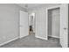 Bedroom showing a closet and bathroom entrance and neutral walls at 1034 Lexi Ct, Ladson, SC 29456