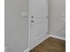 A clean, bright entryway features neutral walls, white trim, and durable wood-look flooring at 1034 Lexi Ct, Ladson, SC 29456