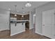 Modern kitchen boasts stainless steel appliances, granite countertops, and pendant lighting at 1034 Lexi Ct, Ladson, SC 29456