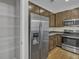 Kitchen featuring stainless steel appliances, ample cabinet space and an adjacent pantry at 1034 Lexi Ct, Ladson, SC 29456