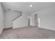 Spacious living room featuring neutral colored walls and plush carpeting throughout at 1034 Lexi Ct, Ladson, SC 29456