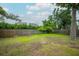 Large backyard featuring a spacious lawn and privacy fence at 106 Brandy Ct, Summerville, SC 29485