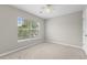 Neutral bedroom with a large window letting in plenty of natural light at 106 Brandy Ct, Summerville, SC 29485