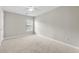 Bright bedroom featuring neutral walls and carpet and a ceiling fan for added comfort at 106 Brandy Ct, Summerville, SC 29485