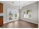 Bright dining area with double doors to the backyard, perfect for indoor-outdoor entertaining at 106 Brandy Ct, Summerville, SC 29485
