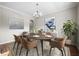 Well-appointed dining room featuring modern furniture, stylish lighting, and tasteful decor at 106 Brandy Ct, Summerville, SC 29485