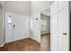 Welcoming entryway featuring a double door, side window and stylish wood floors leading into the home at 106 Brandy Ct, Summerville, SC 29485